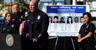 Los Angeles Police Lt. Marc Evans addresses the media after arrests to break up a sex trafficking ring in Van Nuys in 2016. The latest sweep, involving the Sheriff's Department, targeted traffickers in Compton. (Mel Melcon / Los Angeles Times)