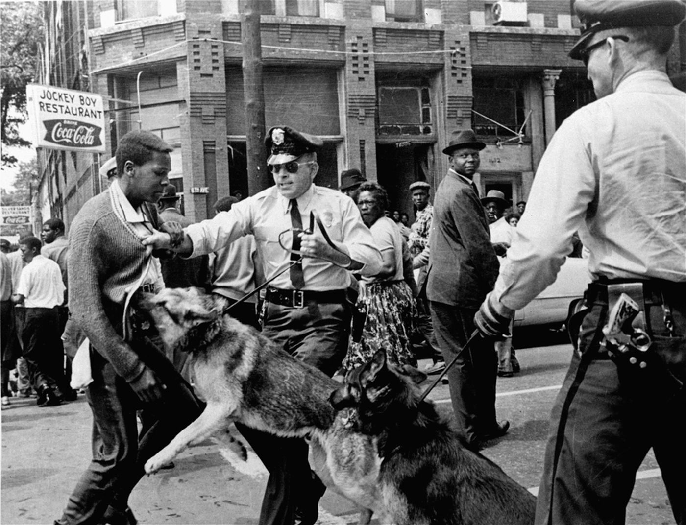 A 17-year-old Civil Rights demonstrator is attacked by a police dog in Birmingham, Ala., on May 3, 1963. This image led the front page of the next day's New York Times. Bill Hudson/ASSOCIATED PRESS